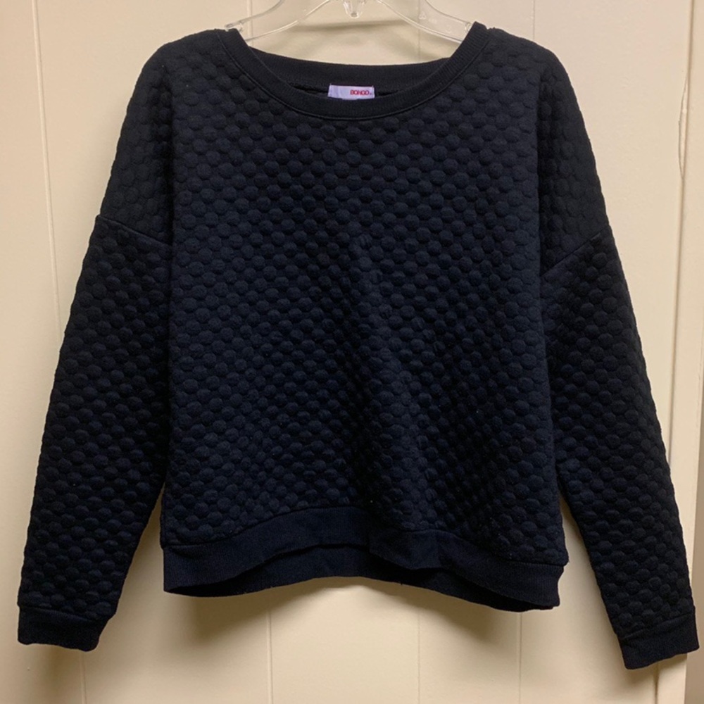 black quilted sweater